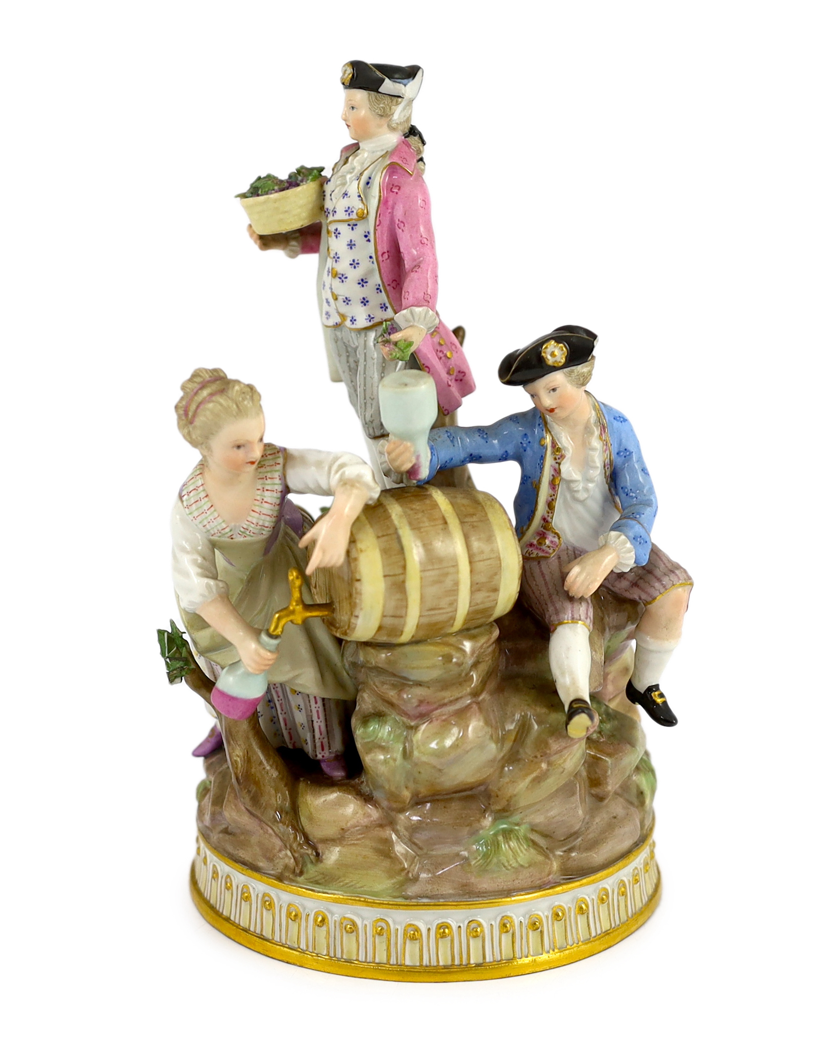 A Meissen group of grape pickers with barrels of wine, 19th century, chips to hats